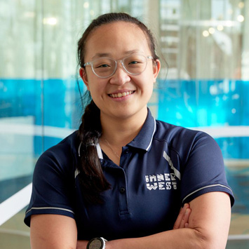  Headshot photo of personal trainer Jane wearing navy blue Inner West uniform